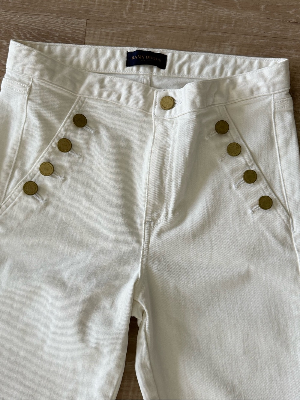Ramy Brook White High-Rise Jeans with Brass Button Accents